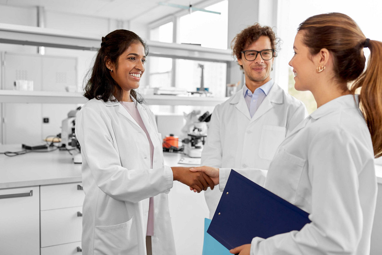 Mouse in gloved hand